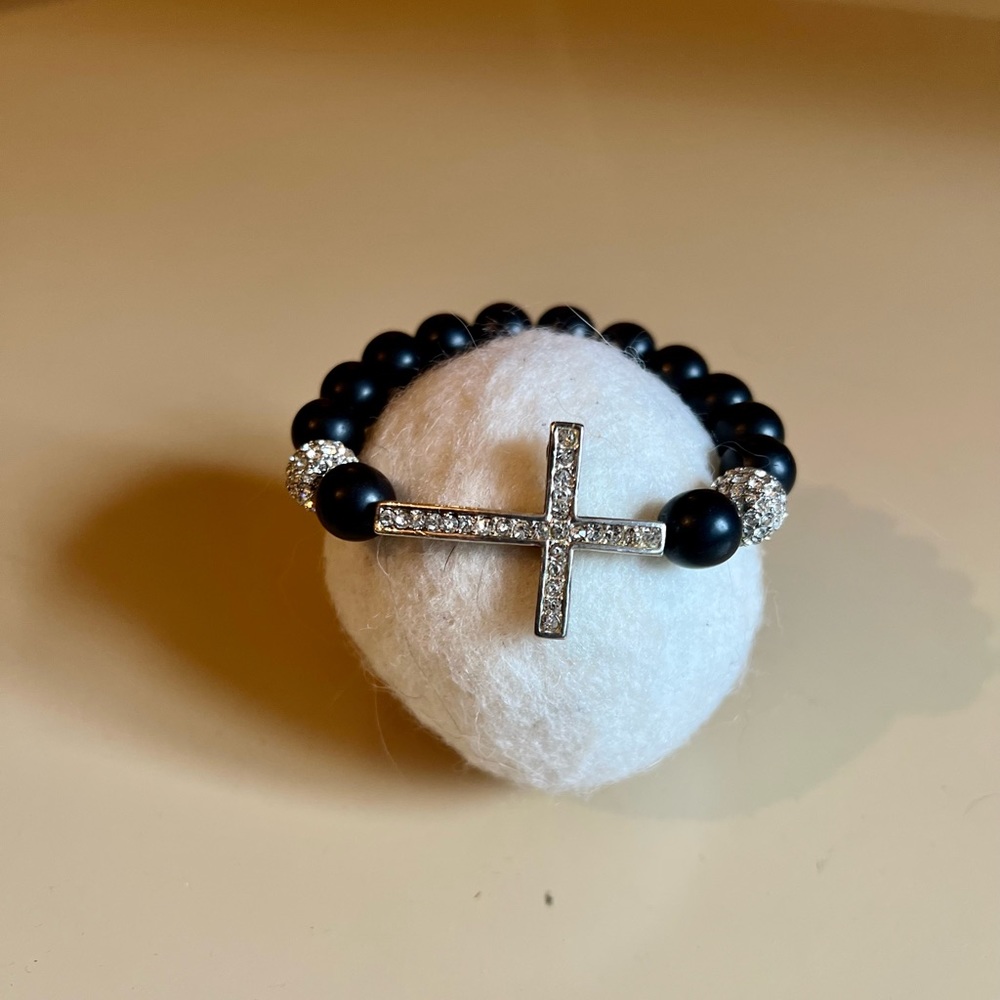 Black bead bracelet with crystal cross